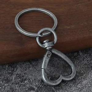 Mosquetón de aleación de zinc en forma de corazón llavero accesorio para crear joyería fina.