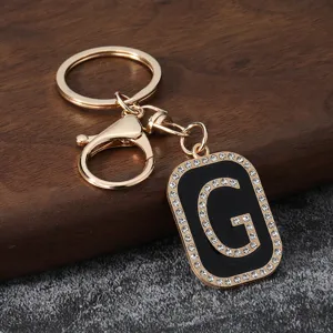 Metal rhinestone letter G keychain luxury car key ring backpack pendant jewelry accessory.