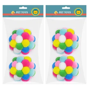 Colorful plush pom pom cat toy balls in transparent hanging package for pet fun and daily play.