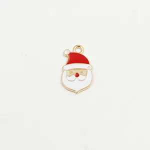 Close up of a cute Santa Claus enamel metal charm pendant for DIY bracelets and necklaces.