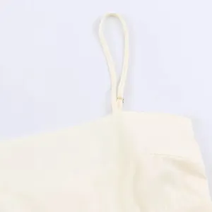 Detailed view of women camisole strap, adjustable design, soft fabric, minimalist fashion.