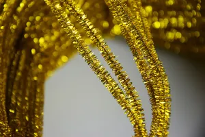 Gold metallic pipe cleaners tinsel stems for DIY craft Christmas decoration detail view