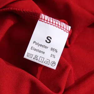 Detailed view of dress care label showing size S and 95 percent polyester material.