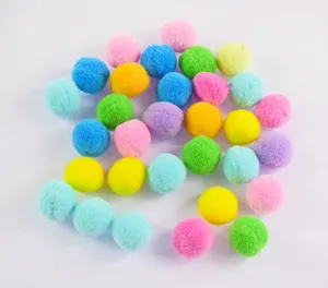 Colorful fluffy plush pom pom balls set, soft DIY craft and funny pet cat teaser toys.