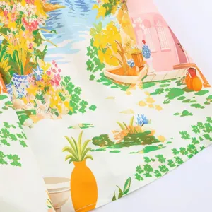 Detailed view of the artistic pastoral landscape print on women's summer vacation dress.