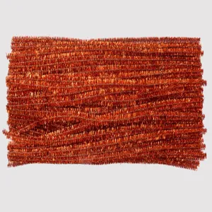 Orange metallic tinsel stems pipe cleaners detail view for craft DIY holiday decoration.