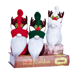 Christmas plush gnome ornaments with cute reindeer antlers and knitted hats for holiday decor.