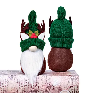Christmas gnome plush doll ornament with knitted curved hat and deer antlers for holiday decor.