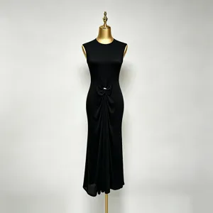 Details of black sleeveless dress, waist twist and gathered design, elegant slim fit style.