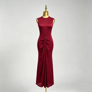 Red sleeveless dress detail view, waist twist pleated decoration, elegant slim fit long design.