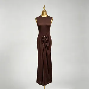 Detailed view of the elegant dark brown sleeveless maxi dress featuring a chic twist waist knot.