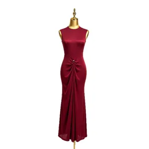 Elegant sleeveless maxi dress with waist twist detail, burgundy slim fit design for summer style.