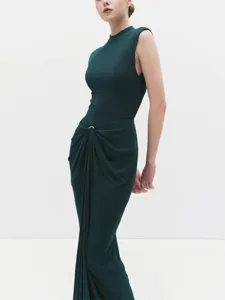 Dark green sleeveless mock neck maxi dress with waist knot and ruching detail for women.