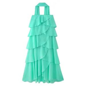 Design halter en mousseline menthe avec volants superposés pour un style d'été élégant.
