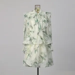 Light cyan bird print ruffles detail view of the vintage forest style long sleeve dress.
