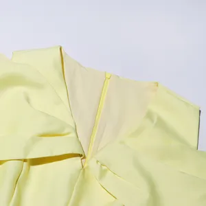 Elegant V-neck solid color women dress detail shot, highlighting the fine collar craftsmanship.