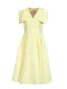 Elegant vintage yellow midi dress with V-neck, short sleeves, and stylish bow shoulders.