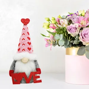 Valentine gnome plush toy detail view featuring pink heart hat and love sign decor.