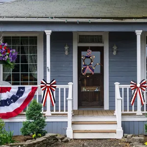 US Independence Day cat shaped lighted twig wreath with patriotic top hat and bow for porch
