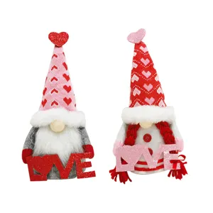 Valentine's Day couple gnome plush dolls with sparkling love signs for romantic decor.