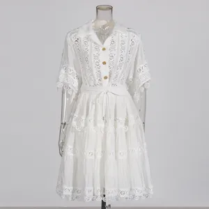 White vintage lace short sleeve dress with lapel collar, tiered skirt and drawstring waist.