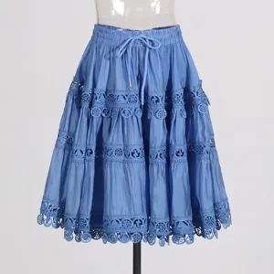 Blue tiered skirt with delicate lace trim, elastic waist and drawstring for comfortable summer wear.