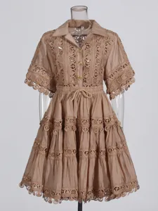 Retro summer lace embroidered lapel short shirt and elegant tiered skirt set for women.