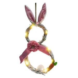 Corona de Pascua conejo luminosa de mimbre colgante con orejas rosas y zanahoria