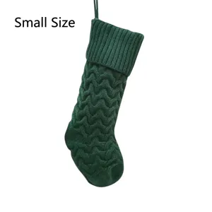 Green knitted Christmas stocking detail, wave pattern hanging gift bag, small size.