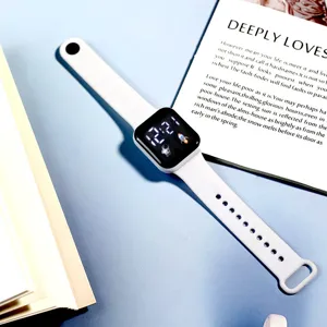 White square digital LED watch with cute astronaut pattern, comfortable silicone strap.