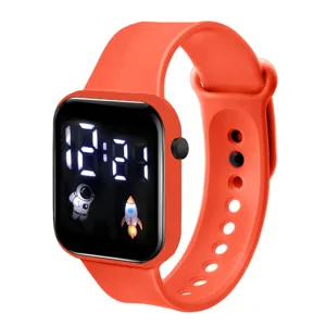 Bright orange square LED digital watch with cute astronaut and rocket design for students.