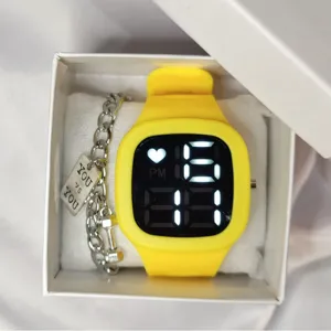 Yellow square digital watch set with silver chain bracelet in gift box, stylish design.