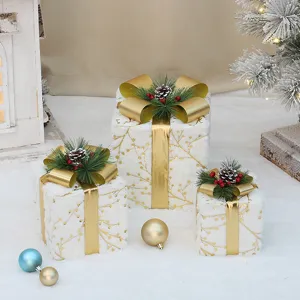 Ensemble de boites cadeau de Noel peluche blanche ruban or pommes de pin decoration fetes