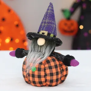 Halloween plush gnome doll with witch hat and pumpkin body for desktop holiday home decor.