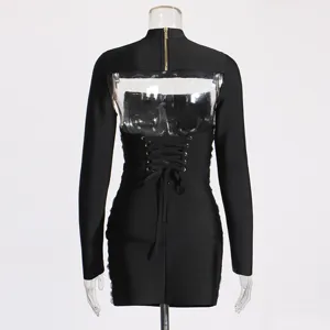 Black long sleeve bodycon dress back detail with transparent panel and lace-up corset.