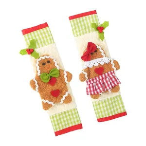 Housses de poignée de réfrigérateur de Noël, protections d'appareil bonhomme pain d'épices.