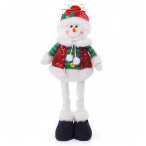 Peluche pupazzo di neve di Natale con gambe lunghe, cappello rosso scintillante e vestiti.