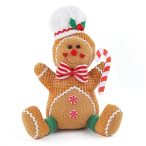 Christmas gingerbread man plush doll detail view, cute chef hat and candy cane design.