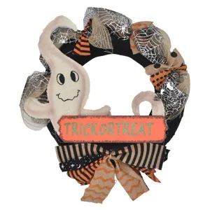 Halloween wreath decoration with ghost and trick or treat sign for party holiday decor.