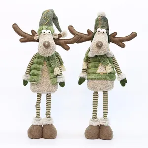Christmas decorative plush reindeer doll with green clothes and retractable legs for home decor.