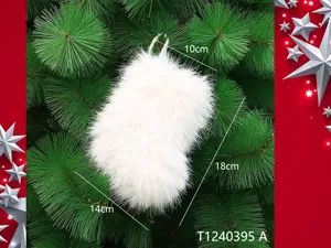 Detailed view of the white plush Christmas stocking ornament hanging on festive tree.