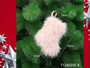 Detailed shot of a soft pink plush Christmas stocking ornament hanging on a festive green tree.