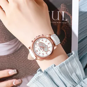 Modische Damen Quarzuhr mit weißem Lederarmband Roségold Gehäuse und Herz Zifferblatt.