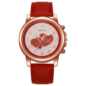 Modische Damen Quarz Armbanduhr mit rotem Lederarmband und herzigem Zifferblatt Design.