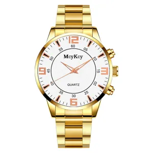Detailed view of the gold quartz watch dial with McyKcy branding and clear time markers.
