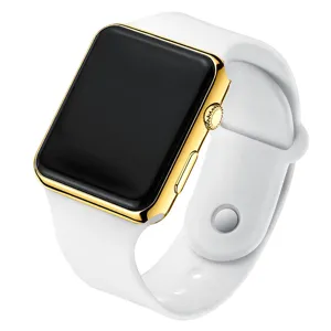 Close-up of square digital watch with gold frame and white silicone strap detail.