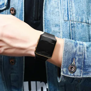 Detailed close-up view of a stylish square LED digital electronic watch worn on the wrist.