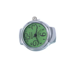 Silver stainless steel ring watch with big green dial and quartz movement main view.