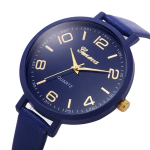 Modische Damen Quarzuhr mit dunkelblauem Zifferblatt goldenen Ziffern und Lederarmband.