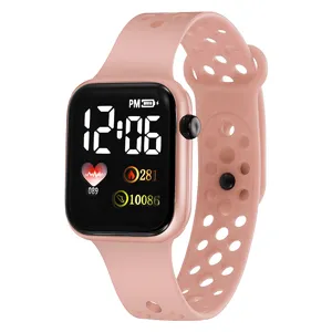 Pink digital sports watch with breathable silicone strap and clear LED digital display screen.